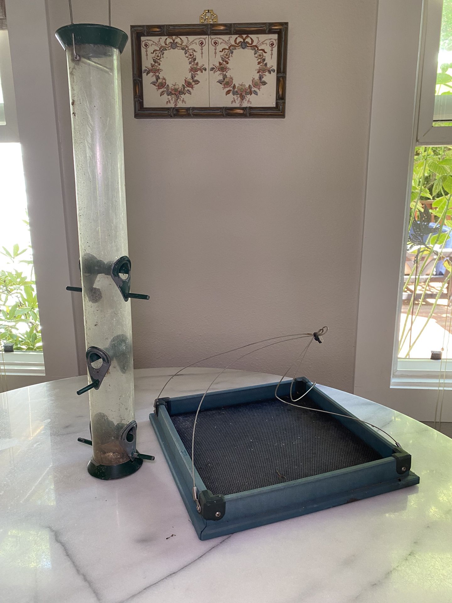 2 Bird Feeders 1 Platform , 1 Tube Feeder Both Used in Good Condition $20 takes both