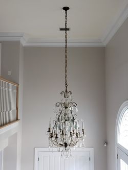 ANTIQUE CRYSTAL AND BRASS CHANDELIER