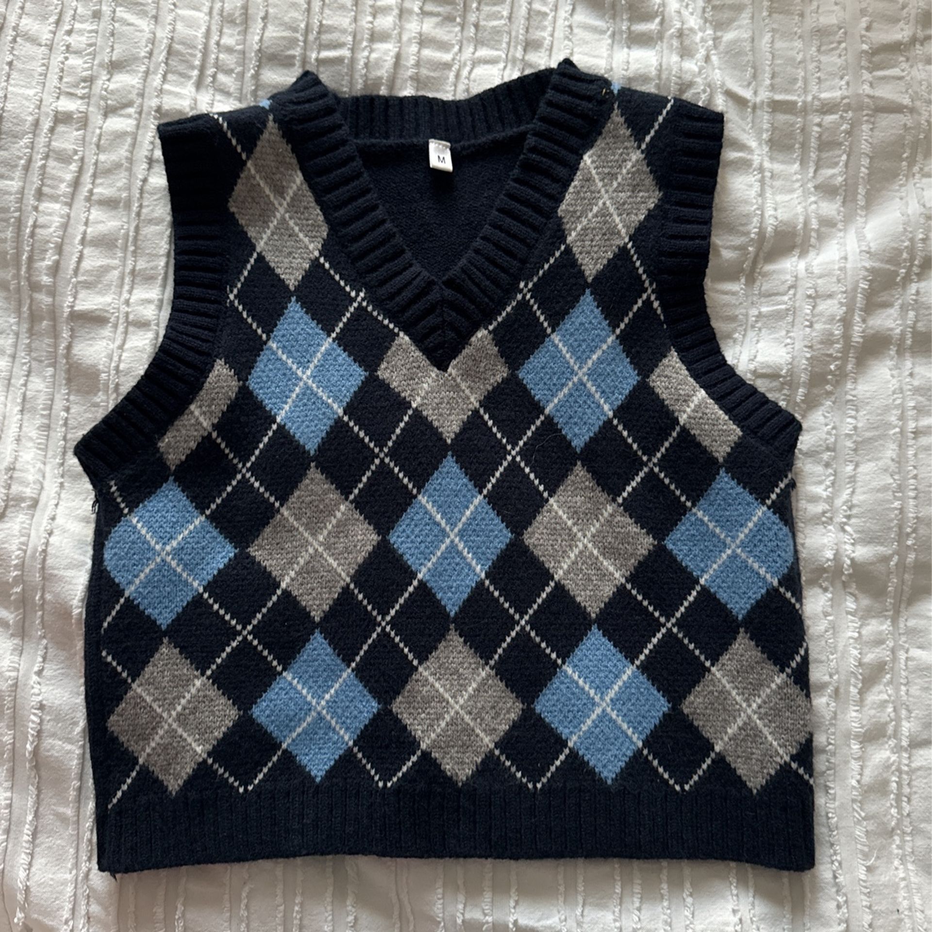 blue rhombus sweater vest