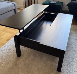 Coffee table with lift top