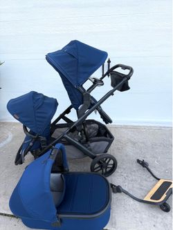 Excellent Uppababy vista v2 double stroller Navy blue and piggyback