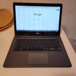 Dell ChromeBook model  13 7310 13.3" Laptop  touchscreen  Intel Celeron 3215U 1.7GHz  4GB RAM 32GB SSD.  Nothing wrong.  Comes with power cord.