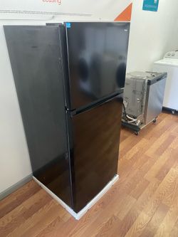 New danby top freezer with 1year warranty included