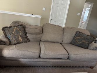 Living room set—large couch, love seat, over-sized chair, and ottoman