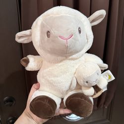 Lamb plushie and baby rattle