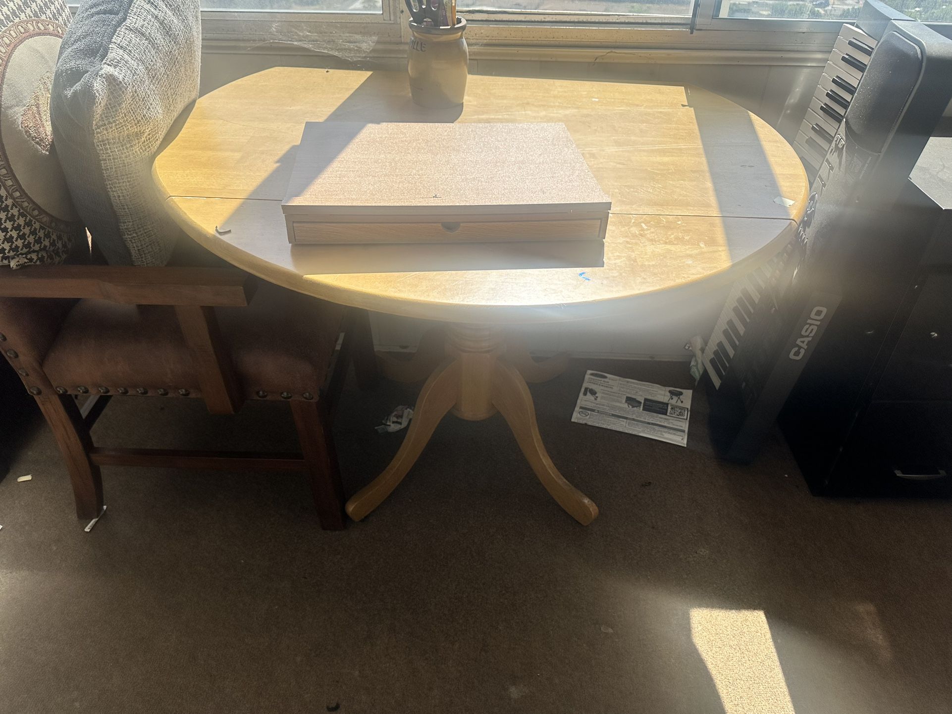 Round Dining Table With Collapsible Edges