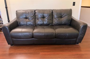 Brown Leather Couch comfortable and well cared for