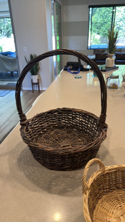 Set a three with her baskets