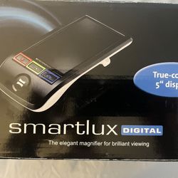 digital magnifier with a sleek black design. Features a true-color 5-inch display for enhanced viewing. This device is wonderful for someone 