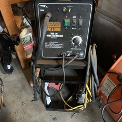 Welder With Cart To Roll Around