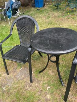 Nice 2 wicker patio chairs with concrete table