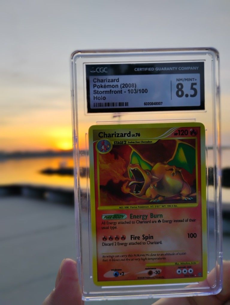 Charizard storm front 8.5 CGC
