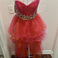 New red strapless high-low cocktail dress with jeweled waist. Size 4 (Small). Elegant, lightweight, and perfect for parties or special occasions.