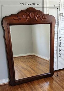 Vintage wooden mirror 
In very clean condition 
Heavy. 
Located(5900 Lewis st Dallas TX 75206)
No holds and cross posted