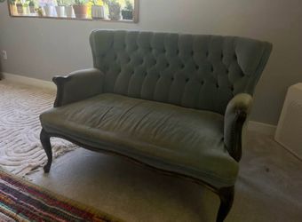 Vintage tufted loveseat
