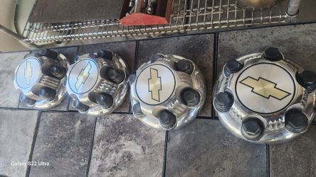 Tengo estas tapas para rrines orijinas de chevi de 6 birlos