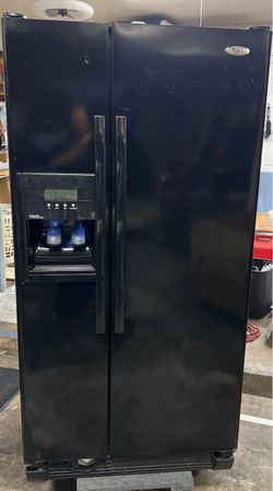 Whirlpool side by side fridge and freezer