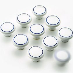  9 bright white ceramic knob with a blue ring. Measures 1 1/2" in diameter by 1 1/8" high.

Mounting bolt included.
