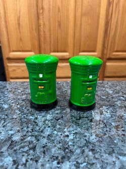 Vintage  Souvenir Ireland Ceramic  Pair of Salt and Pepper Shakers.  Size approximately 3 inches tall.  Preowned never used.  Has been on display in a