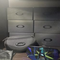 Blue reflective Oakley sun glasses