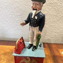 Antique J.E. Stevens Cast Iron Mechanical Bank