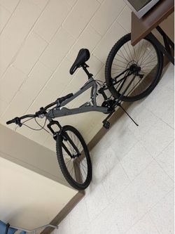 Bike Grey, spring tail with shocks.