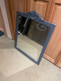 22.25” w x 29” tall blue mirror