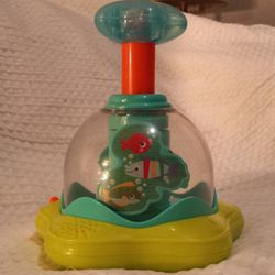 Bright Starts Press And Glow Spinner And Roll & Glow Monkey 