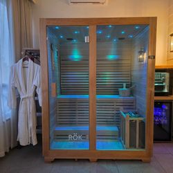 Brand new Indoor Outdoor Sauna With Stone Heater