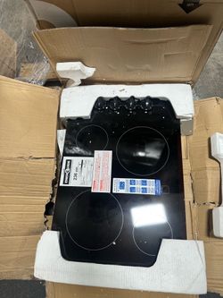 [194].  Frigidaire 30” Electric Cooktop FFEC3025UB Black Glass 4 Element Open Box
