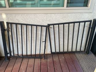 Black steel fence gate.