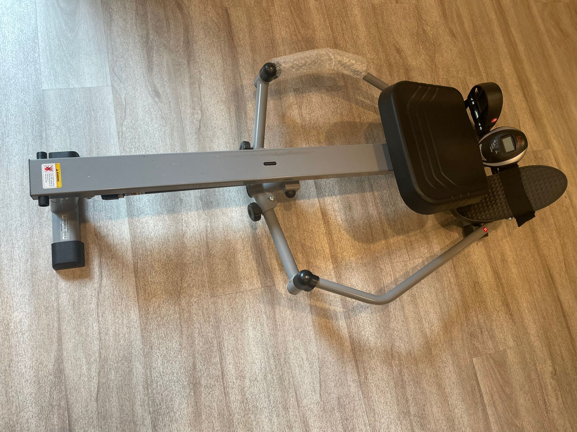 Compact Rowing Machine, Like New.