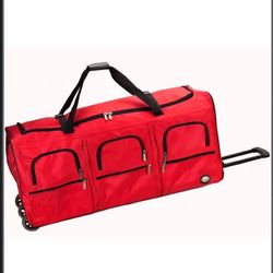 ROCKLAND ROLLING DUFFEL BAG WITH SIX POCKETS. VERY LARGE. 