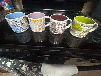 Starbucks Disney coffee mugs set of 4