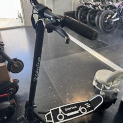 Electric scooter with shock absorption