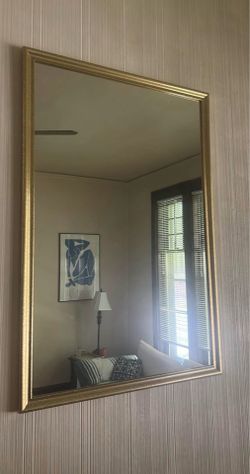 large gold rectangular mirror