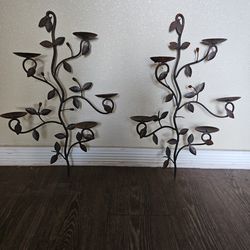 2 metal candle holders.
