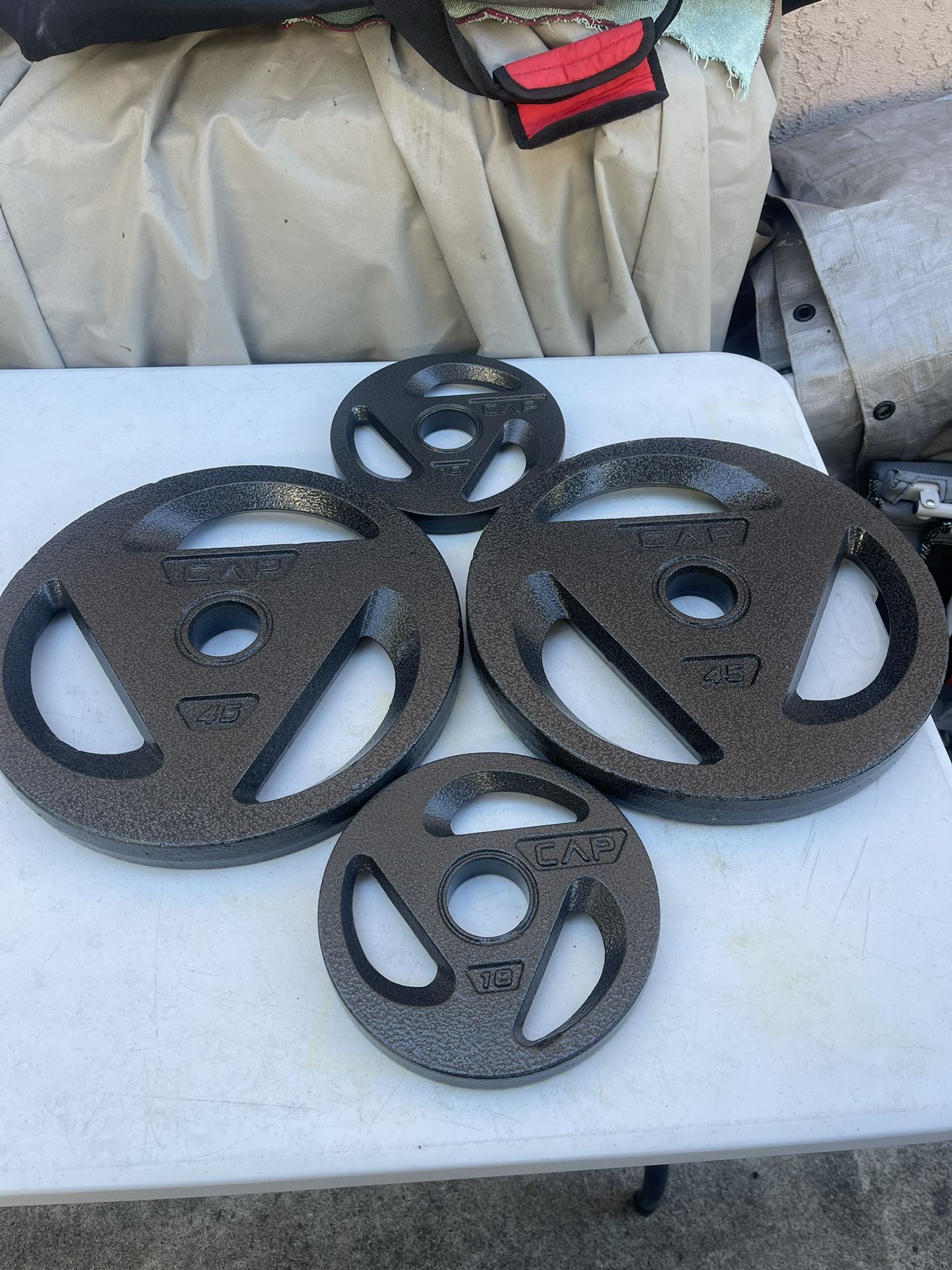 CAP Barbell 2" Olympic Grip Plate, 45lb single