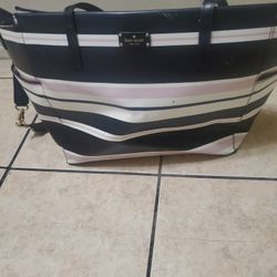 Pañalera Kate Spade $30