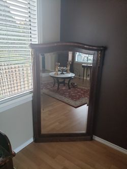 antique mirror It is pure wood very heavy and with beautiful details.