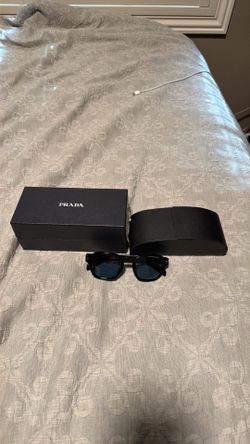 Prada sunglasses blue lens