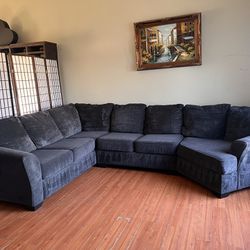 Ashley’s Furniture  Dark Gray 3-piece Sectional Couch