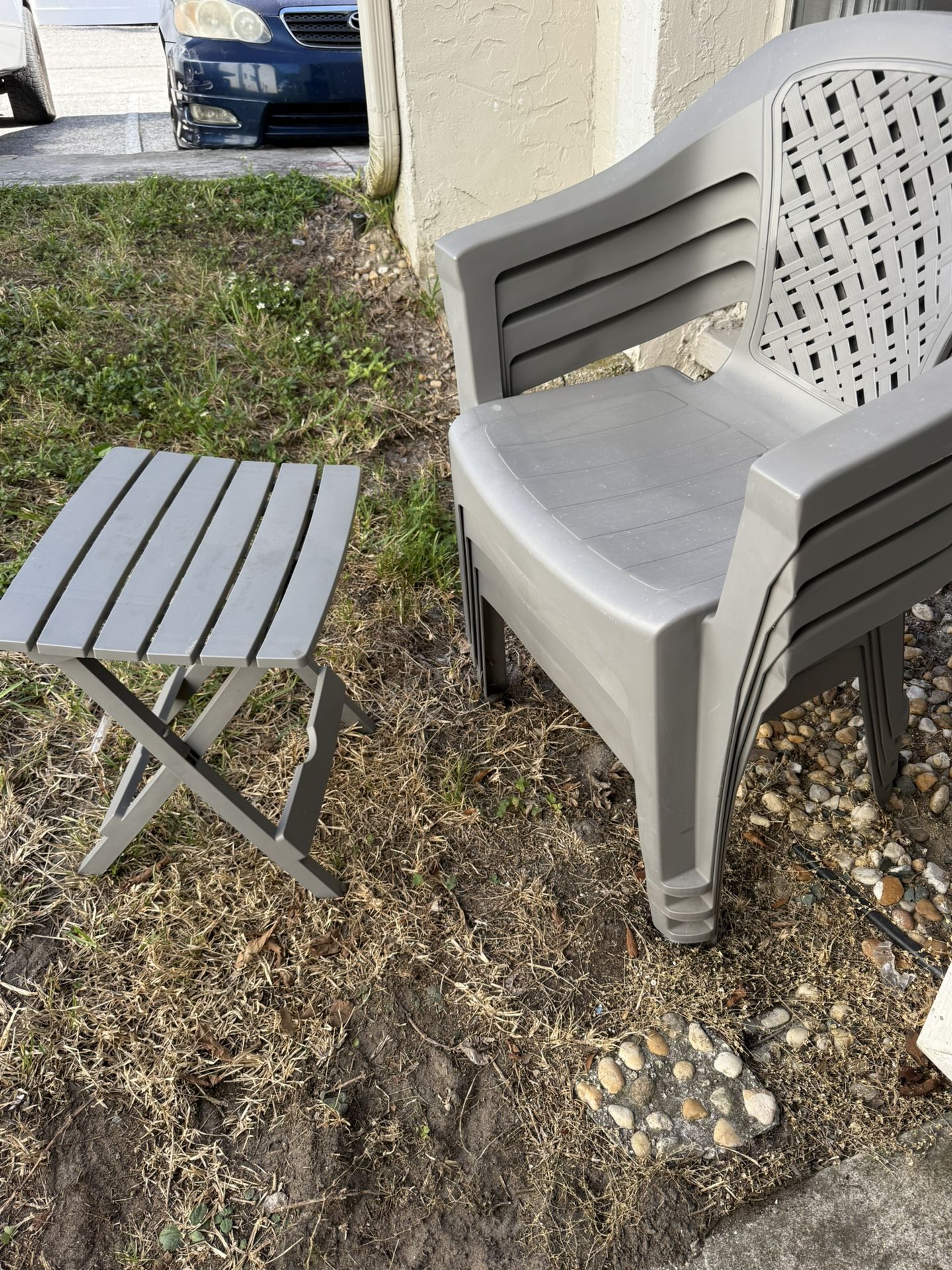 Set of Four Gray Plastic Chairs and Table for an Affordable Price 