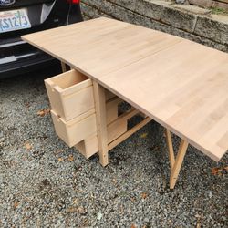 IKEA drop leaf fold down table w/ drawers NORDEN birch space saver tan

Great design fold down table for storage in small spaces 