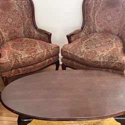 Two Queen Anne chairs and a coffee table 
