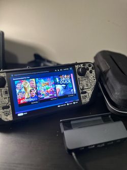 STEAM DECK OLED 1TB – LIKE NEW – ONLY 40 HOURS OF GAMEPLAY – CASE & CHARGER INCLUDED