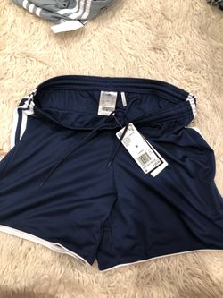 Adidas women’s running short, mid length new w tag