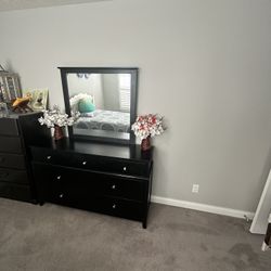 White Bed And Mattress And Black Dresser Table 