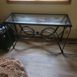 Glass and metal table 47 x 17.5  h28