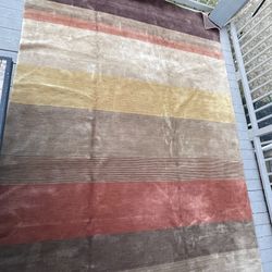 stripped hand made wool rug 10’x14’ pets and smoke free home serious contact only